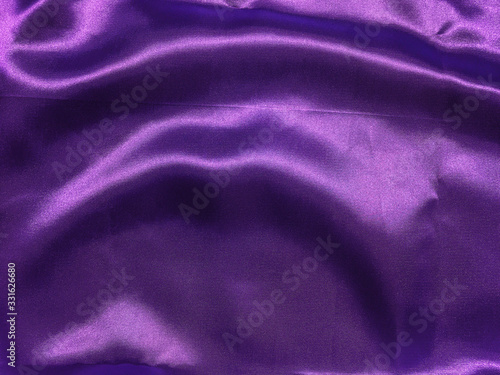 Abstract purple fabric texture background with copy space for design