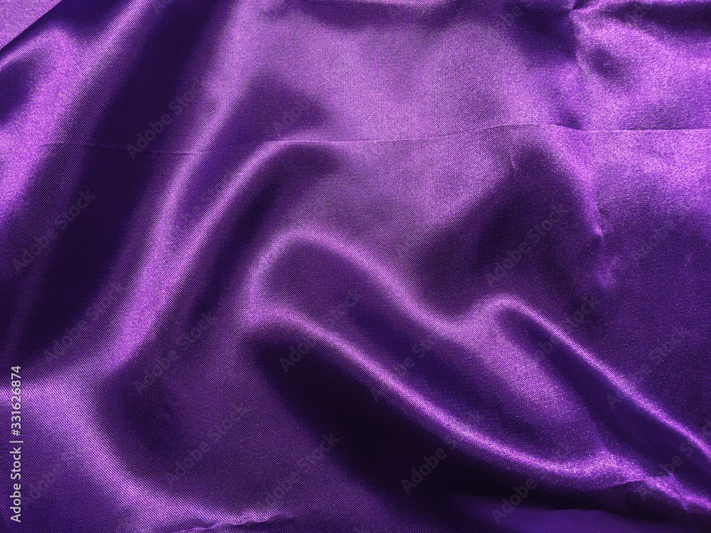 Obraz premium Abstract purple fabric texture background with copy space for design