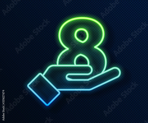 Glowing neon line 8 March on hand icon isolated on blue background. International Happy Women Day. Vector Illustration