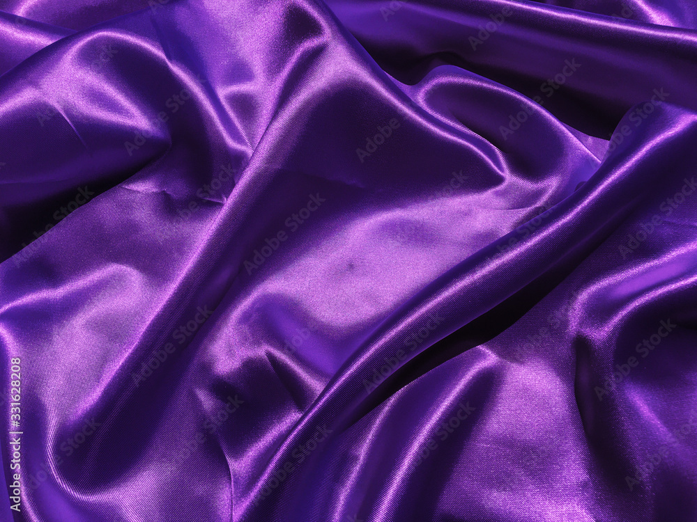 Pattern of purple fabric texture background. wavy folds of grunge silk texture satin velvet material for design Pattern of purple fabric texture background. wavy folds of grunge silk texture satin velvet material for design
