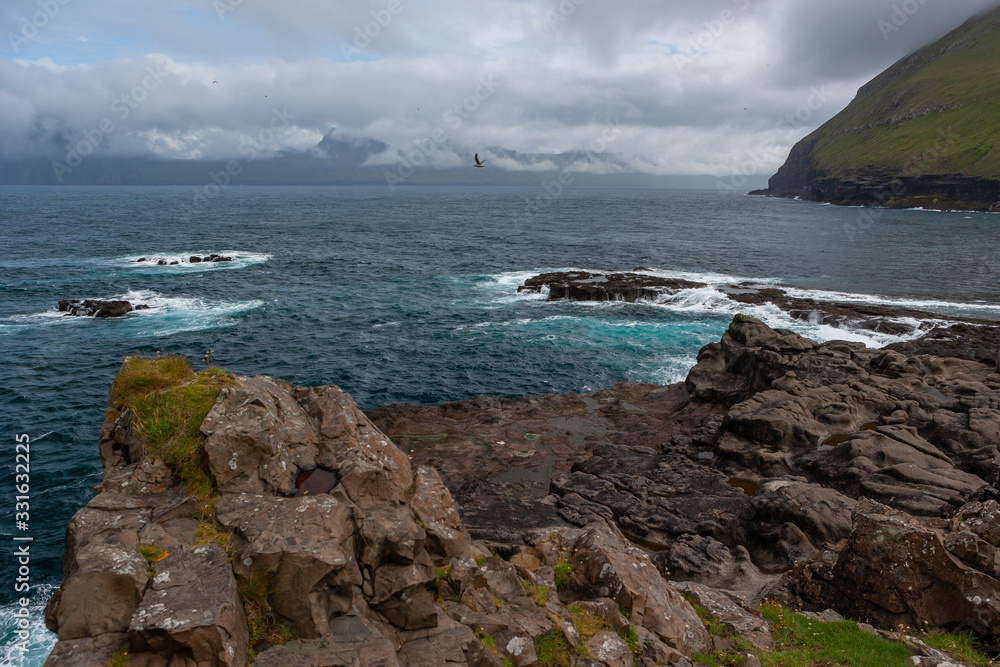 Obraz premium The Faroe Islands is an archipelago in the North Atlantic Ocean on the southwestern edge of the Norwegian Sea.