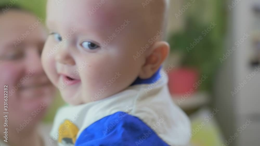Portrait of a chubby eight-month-old baby. Close up shot. Portrait of a chubby eight-month-old baby. Close up shot.