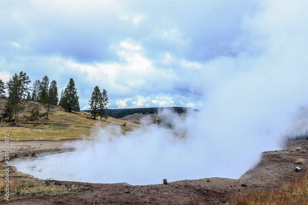 Fototapeta premium Streaming geyser basin in Yellowstone National Park, USA