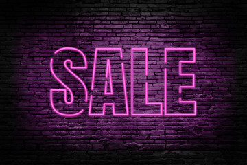 Sale advertisement, realistic pink neon sale text banner on black brick walls.