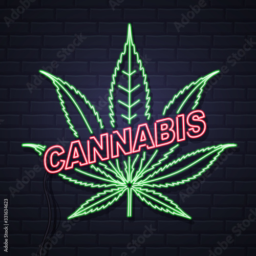 Neon Cannabis leaf sign on brick wall background. Helm icon design.