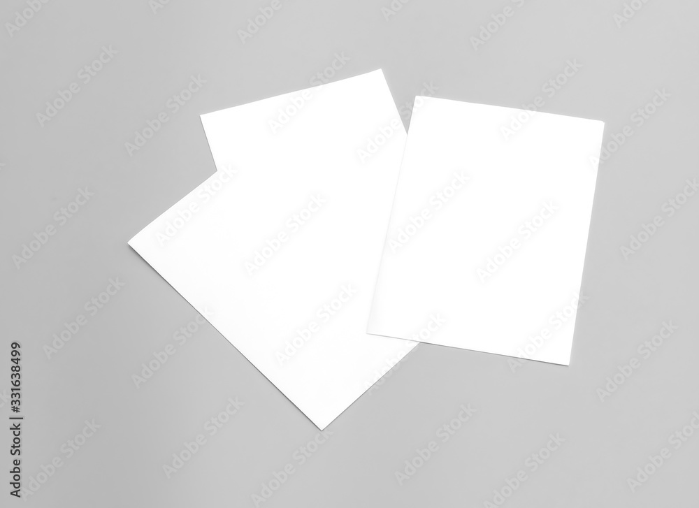 Blank portrait A4. Mock-ups white paper isolated on gray background. can use banners magazine products business texture newspaper. Blank portrait A4. Mock-ups white paper isolated on gray background. can use banners magazine products business texture newspaper.