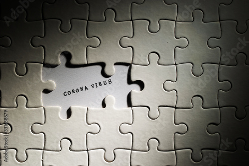 Jigsaw puzzle and corona virus words