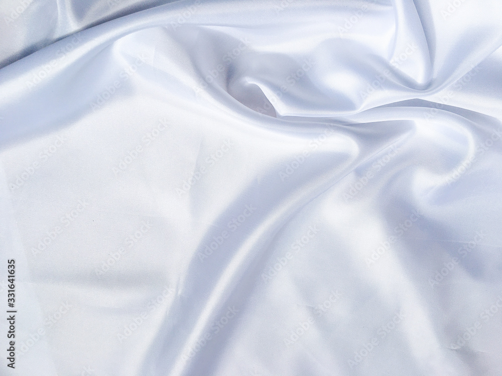 Solf white satin fabric texture background. use as wedding or aniversary day with copy space for design Solf white satin fabric texture background. use as wedding or aniversary day with copy space for design