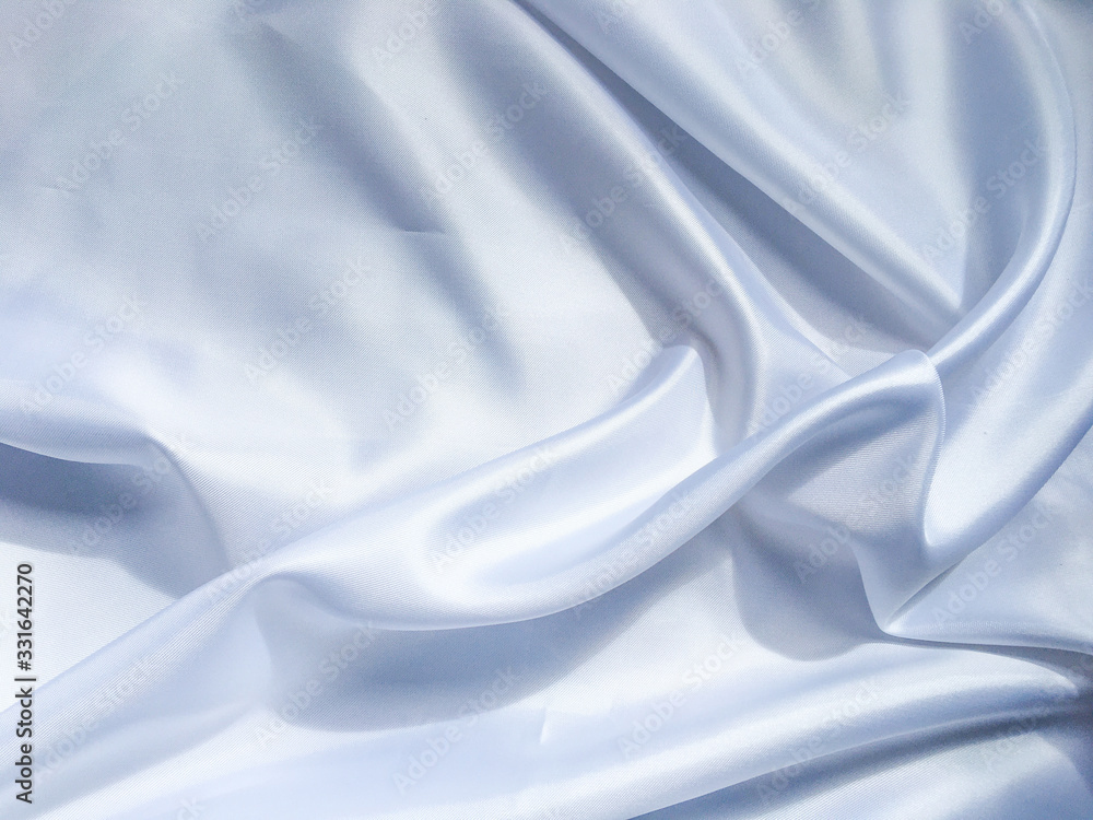 Obraz premium Solf white satin fabric texture background. use as wedding or aniversary day with copy space for design