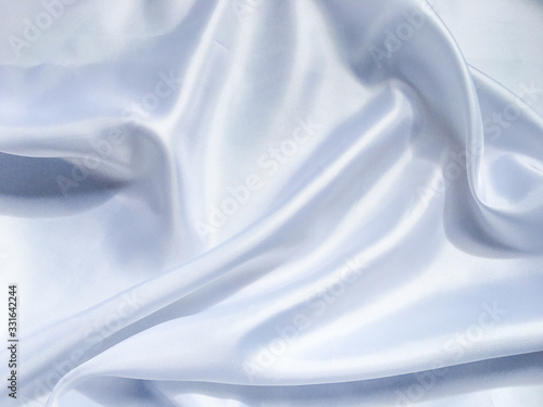 Solf white satin fabric texture background. use as wedding or aniversary day with copy space for design