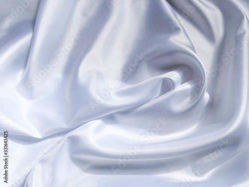 white crumpled fabric texture background. Silk curtain with fold waves for design