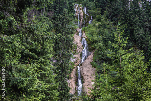 Cascada Cailor - waterfall located in Rodna Mountains national park in Romania photo