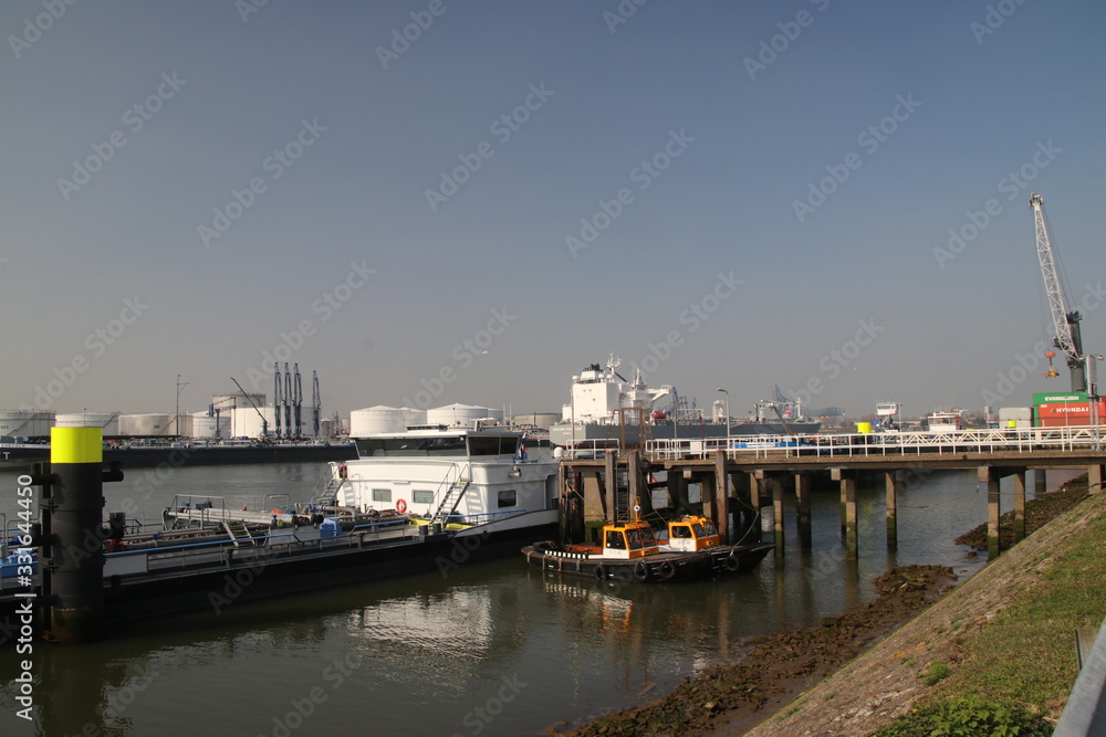 Pier at the Pernis harbor to load fuel on inland ships in the Rotterdam Port The Netherlands
