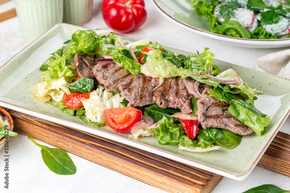 Salad of meat, tomato, cucumbers and fresh herbs Salad of meat, tomato, cucumbers and fresh herbs