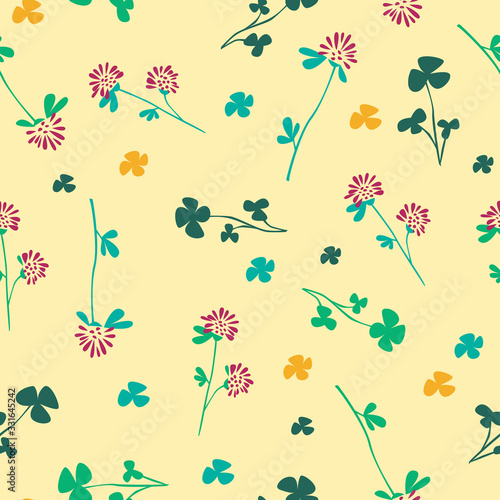 Spring or summer seamless pattern with clover flowers and leaves on a yellow background for printing on fabric or textile, Scandinavian vector stock illustration with random wildflowers