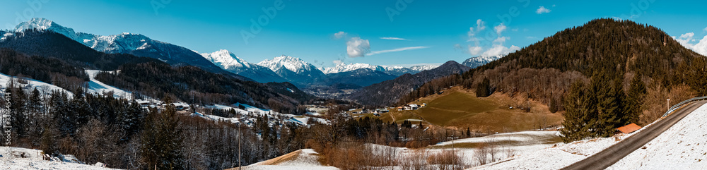 High resolution stitched panorama of a beautiful winter landscape with mountains in the background near Berchtesgaden, Bavaria, Germany