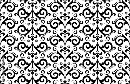 Wallpaper in the style of Baroque. Seamless vector background. White and black floral ornament. Graphic pattern for fabric, wallpaper, packaging. Ornate Damask flower ornament