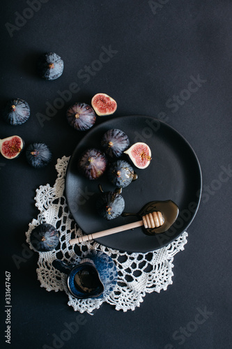 Top view of figs on a dark background