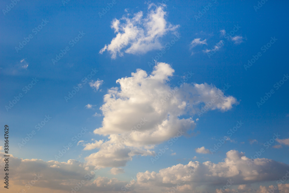Beautiful white clouds on blue sky. View from high mountain, landscape with fog mountain, Beautiful morning before sunrise. Blank gradient blue sky with white cloud. Beautiful white clouds on blue sky. View from high mountain, landscape with fog mountain, Beautiful morning before sunrise. Blank gradient blue sky with white cloud.