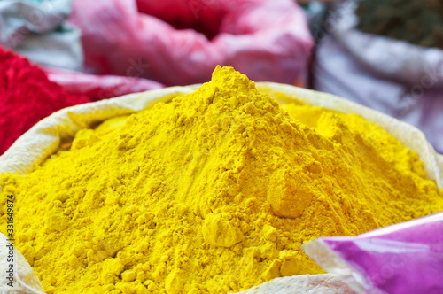 Colorful holi powder for sale at market