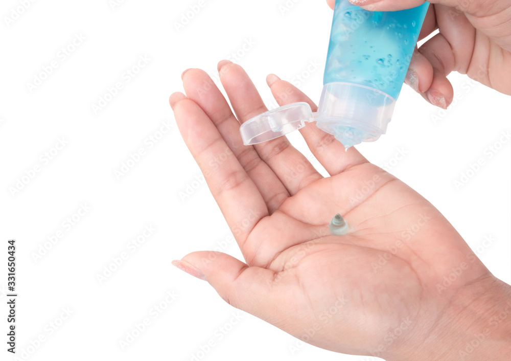 Woman hand using alcohol gel in plastic tube for washing hand, health care and medical concept Woman hand using alcohol gel in plastic tube for washing hand, health care and medical concept