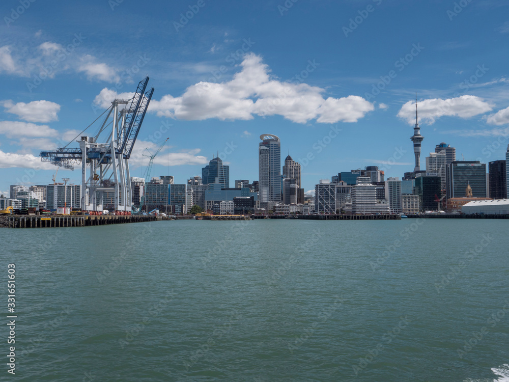 Auckland New Zealand Harbour cranes and boats containers