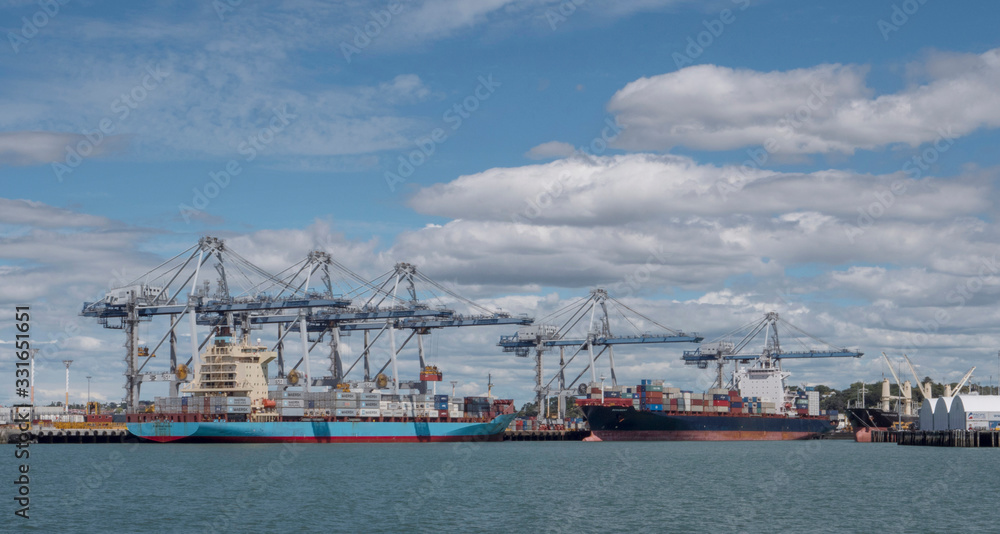Auckland New Zealand Harbour cranes and boats containers