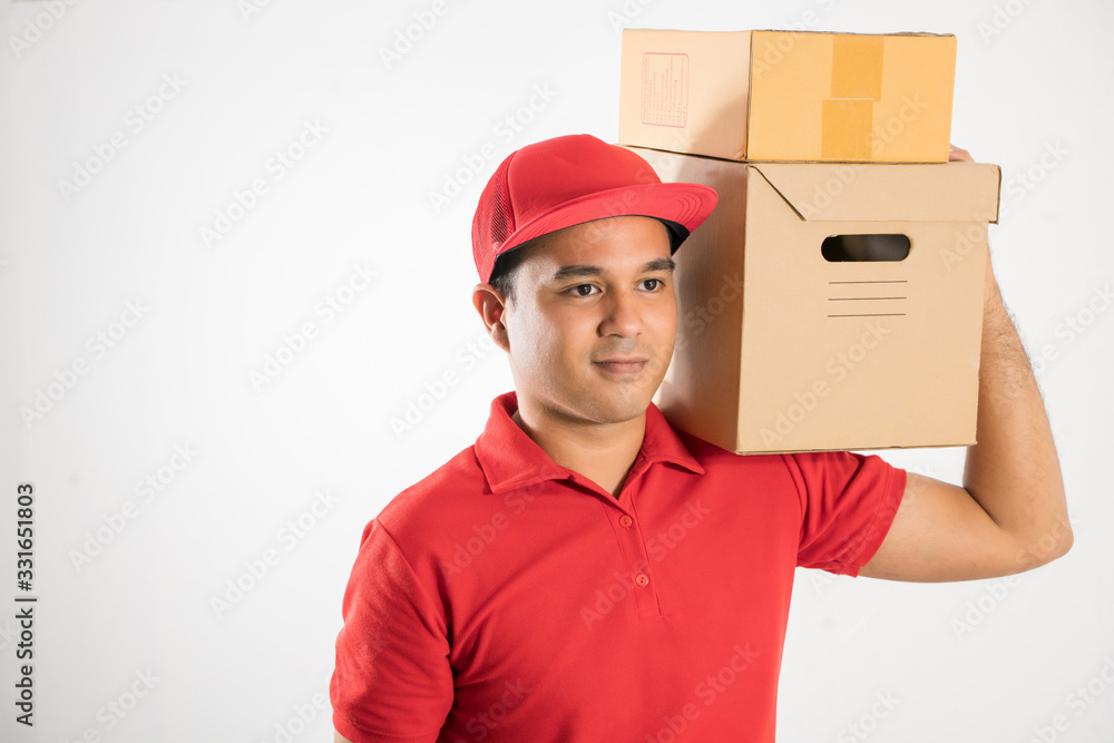 Red Delivery handsome asian man holding parcel cardboard box on isolated white background. Red Delivery handsome asian man holding parcel cardboard box on isolated white background.