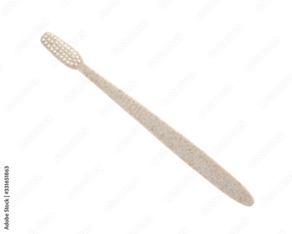 Toothbrush made from biodegradable material, isolated on a white background Toothbrush made from biodegradable material, isolated on a white background