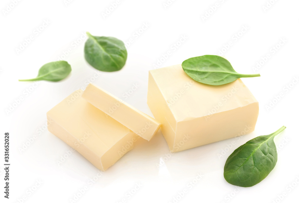 Butter and spinach isolated on white Butter and spinach isolated on white
