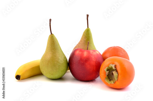 Fruits isolated on white background. Red apple, banana, kaki fruits and pears.