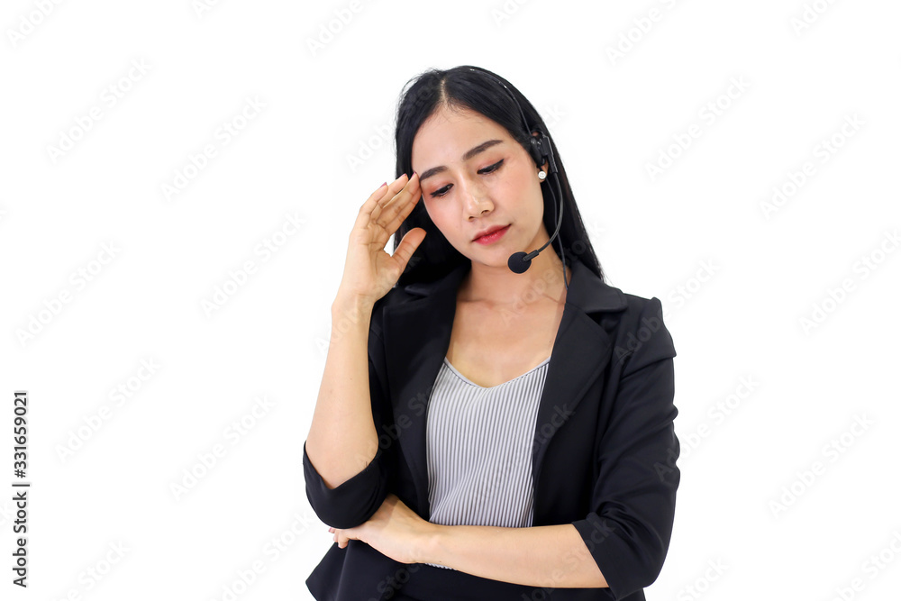Beautiful asian woman Serious call center operator in wireless headset talking with customer,in customer support service. Beautiful asian woman Serious call center operator in wireless headset talking with customer,in customer support service.