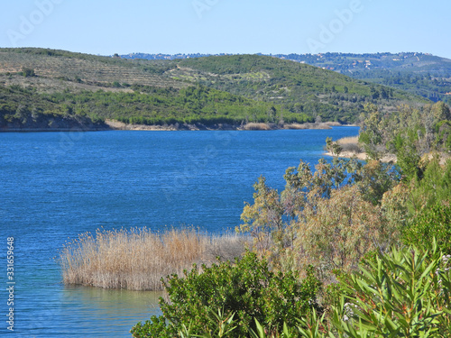 Beautiful dam of Marathon or Marathonas an artificial water reservoir of Athens, Attica, Greece photo