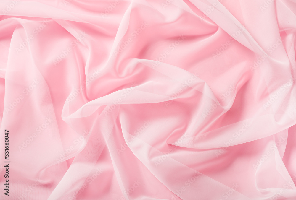 Tender pink silk draped fabric background Tender pink silk draped fabric background