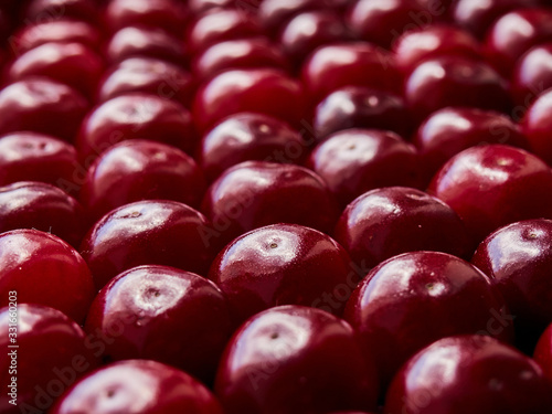 A fresh red cherries background.