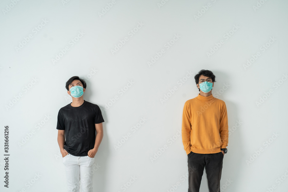 social distancing. people with masks keep their distance during virus symptoms - obrazy, fototapety, plakaty 
