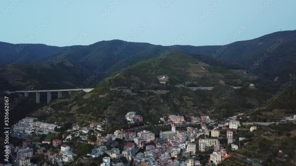 Italy, Cinque Terre aerial with Mavic 2 Pro, wide of mountaintop pulls out to reveal city and port