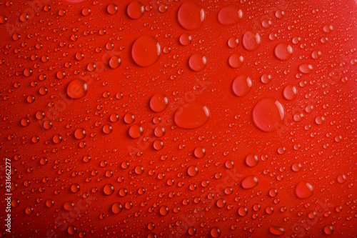 Water drops on red background