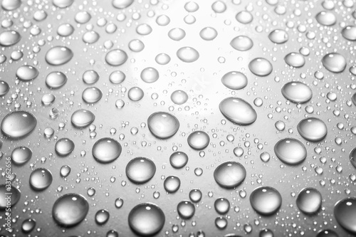 Water drops on light grey background