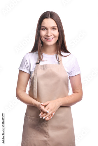 Quadro su tela Young woman in apron isolated on white background
