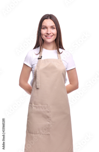 Murais de parede Young woman in apron isolated on white background