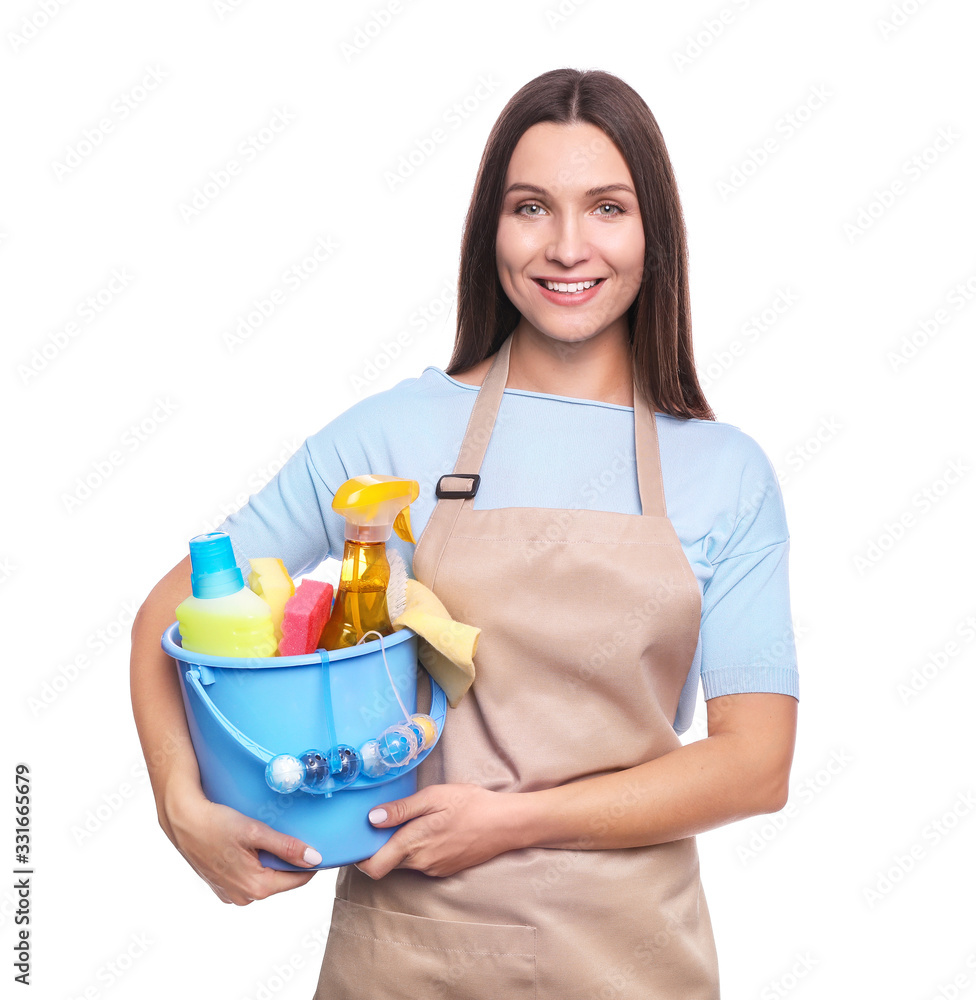 Young woman in apron isolated on white background. Cleaning concept Young woman in apron isolated on white background. Cleaning concept