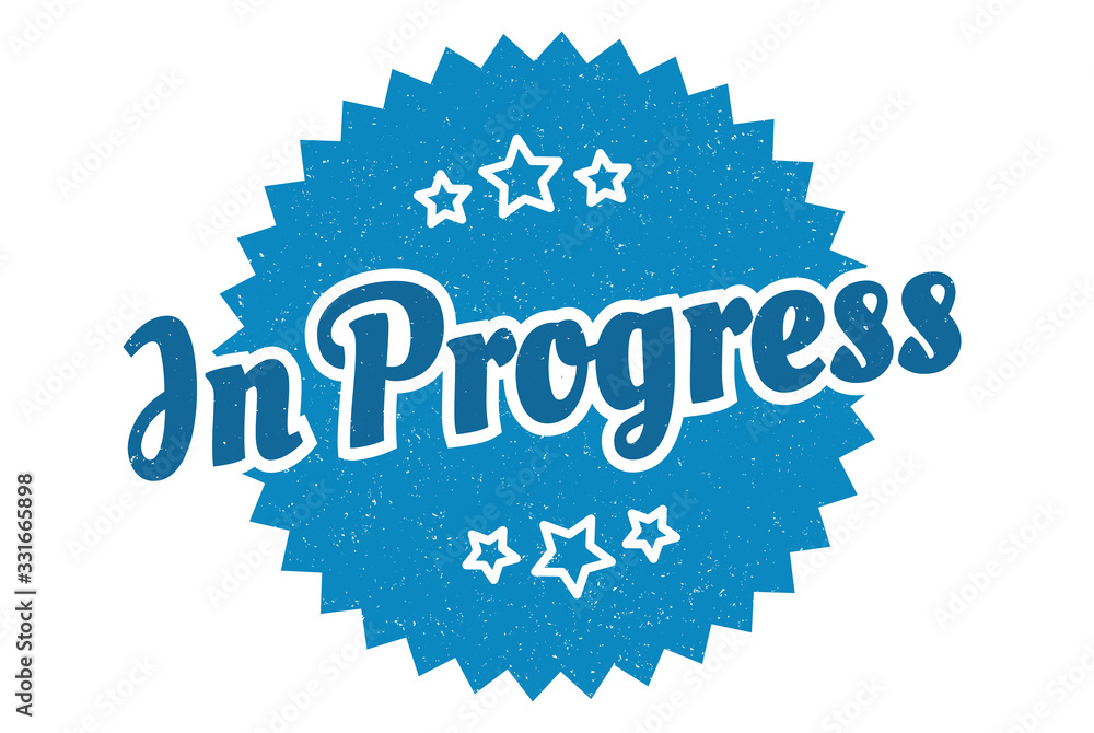 Fototapeta premium in progress sign. in progress round vintage retro label. in progress