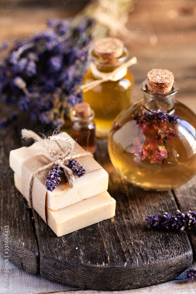 Concept of natural handmade home soap with organic oil for gentle skin care. Pleasure, relax, anti-stress. Atmosphere of harmony and serenity. Wash hand in epidemy. Wooden rustic background, closeup.
Concept of natural handmade home soap with organic oil for gentle skin care. Pleasure, relax, anti-stress. Atmosphere of harmony and serenity. Wash hand in epidemy. Wooden rustic background, closeup.