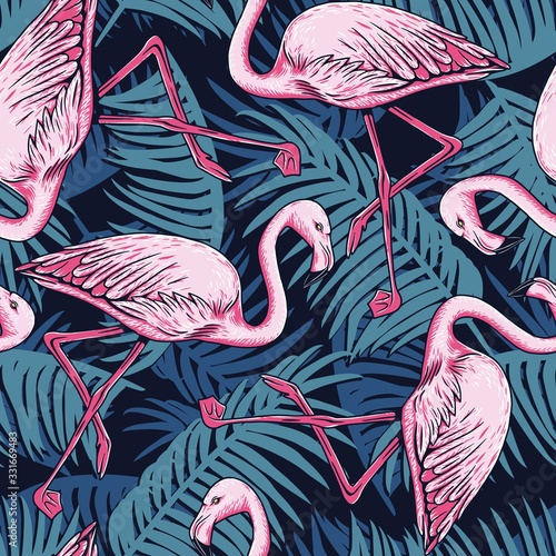 Pink flamingo and palm leaves seamless pattern
