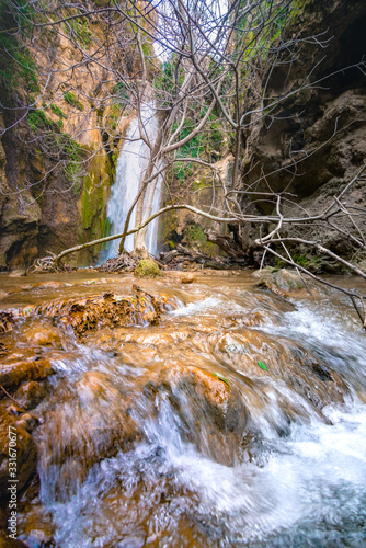 Waterfall in the gorge of Oreino near famous beach of Agia Fotia, Ierapetra, Crete, Greece. photo