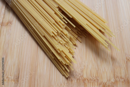 dry pasta strands in a patttern