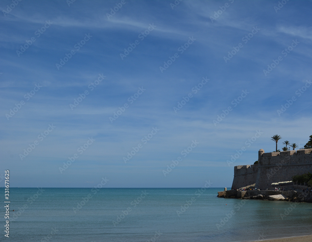 Picturesque castle on the seashore, summer's day