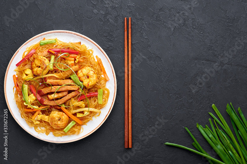 Photography Singapore Mei Fun in white plate on dark slate background