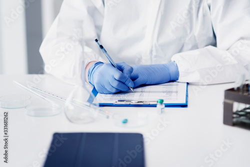 Science technician making a medical exam.